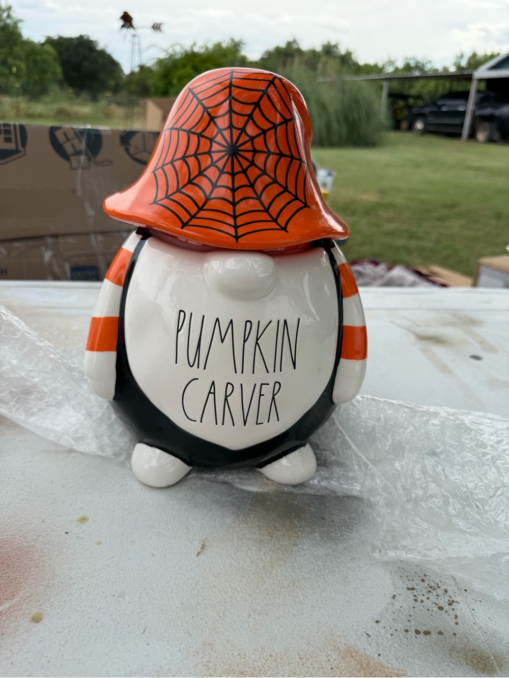 Rae Dunn White and Orange cookie jar with Black Rim